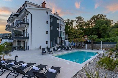 Ferienwohnung mit Pool und Meerblick