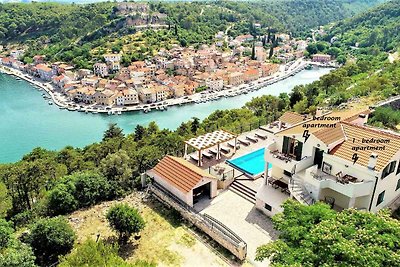 Ferienwohnung mit Balkon und Pool