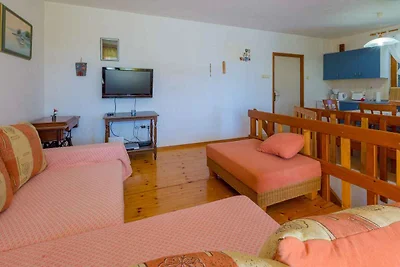 Ferienhaus mit Klimaanlage und Balkon