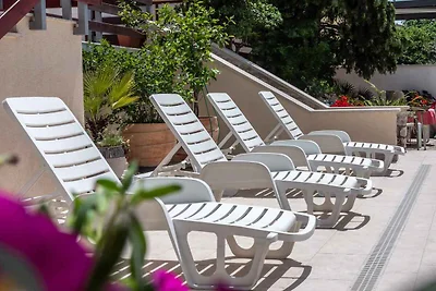 Ferienwohnung mit Aussenpool und Meerblick