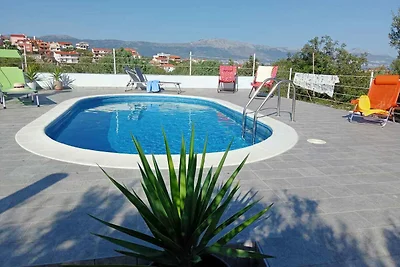Ferienwohnung mit einem Gemeinschaftspool mit
