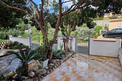 Ferienhaus mit Garten und Klimaanlage