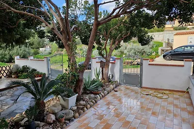 Ferienhaus mit Garten und Klimaanlage