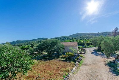 Ferienhaus mit Garten und Klimaanlage