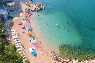 Ferienwohnung mit Pool- und Meerblick