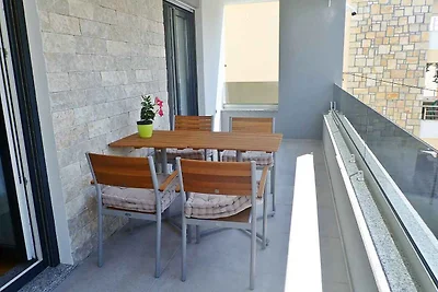 Ferienhaus mit Pool und Meerblick