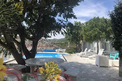 Ferienwohnung mit Poolnutzung und Meerblick
