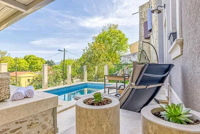 Ferienhaus mit beheiztem Privatpool