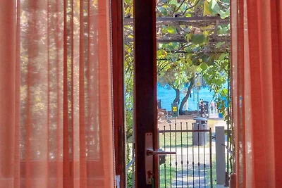 Ferienwohnung mit schönem Balkon mit Tisch un