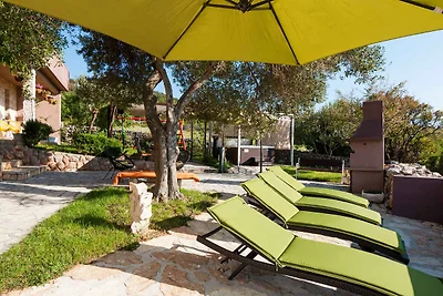 Ferienhaus mit Pool und Meerblick
