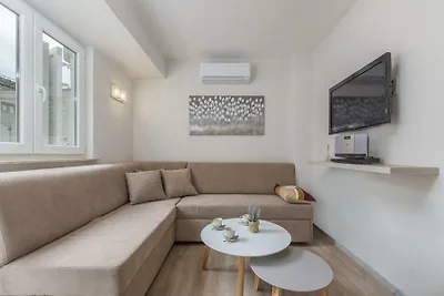 Ferienwohnung mit Klimaanlage und nur 30 M vo
