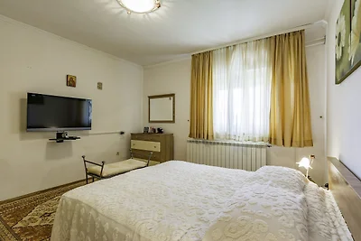 Ferienwohnung mit Garten und Klimaanlage