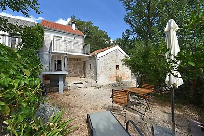 Ferienhaus mit Garten und Klimaanlage