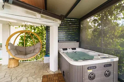 Ferienhaus mit Whirlpool und Klimaanlage