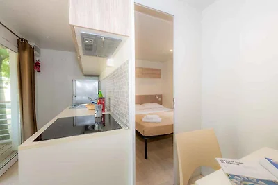Mobilehome mit Parkplatz und Klimaanlage