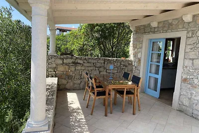 Ferienhaus mit Garten und Meerblick