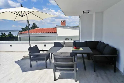 Ferienhaus mit Pool und Meerblick