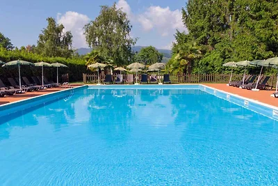 Ferienwohnung mit Balkon oder Garten und Pool