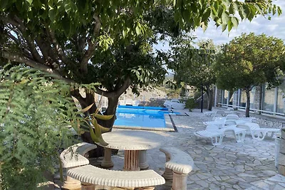 Ferienwohnung mit Poolnutzung und Meerblick