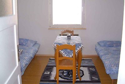 Ferienwohnung mit gemeinsamem Garten und