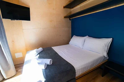 Mobilehome mit Klimaanlage und Holzveranda