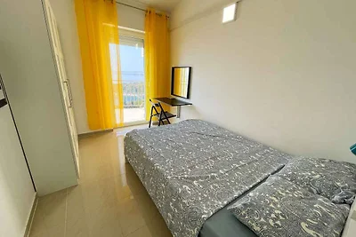 Ferienwohnung mit Balkon und Meerblick