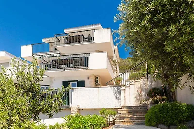 Ferienhaus mit Pool und Meerblick