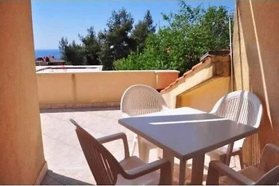 Ferienwohnung mit Pool und Meerblick