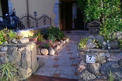 Ferienhaus mit Garten und Klimaanlage