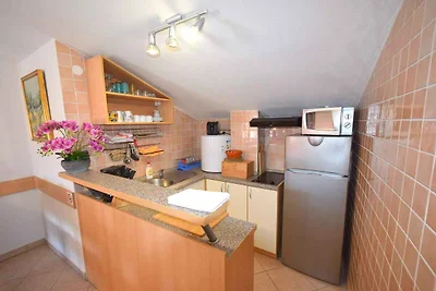 Ferienwohnung in Mansarde mit Meerblick