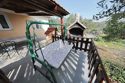 Ferienhaus mit Garten und Meerblick