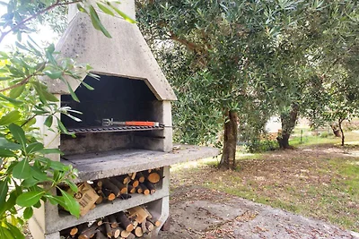 Ferienwohnung mit einer überdachten Terrasse