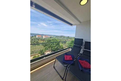 Ferienwohnung mit Garten und Klimaanlage