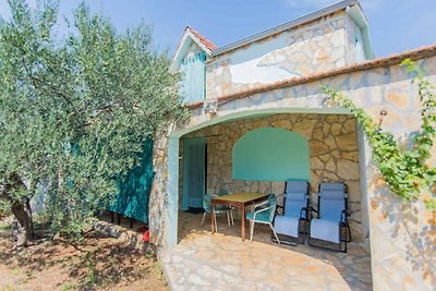 Ferienhaus mit Garten und Meerblick