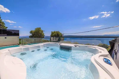 Ferienhaus mit Pool und Meerblick