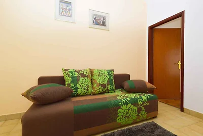 Ferienwohnung mit Balkon mit Gartenmöbeln