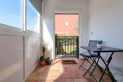 Ferienwohnung mit einer mit Tisch, Stühlen un