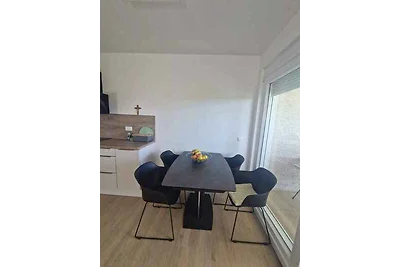 Ferienwohnung mit Garten und Klimaanlage