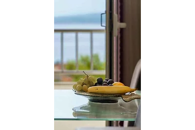 Ferienwohnung mit einen Balkon und Meerblick