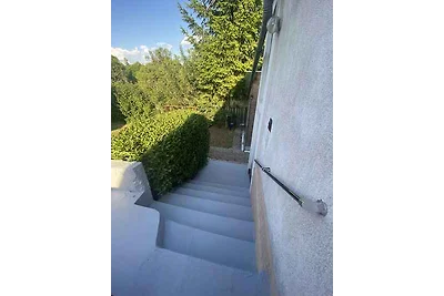 Ferienhaus mit Schaukel und Gartendusche