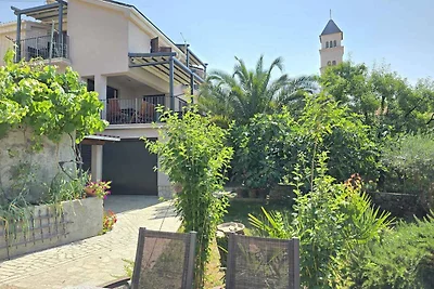 Ferienwohnung mit Garten und Klimaanlage