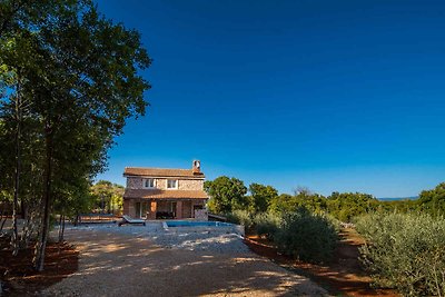 Ferienhaus mit Klimaanlage, mit Grillmöglichk