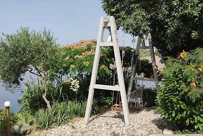 Ferienwohnung mit Poolnutzung und Meerblick