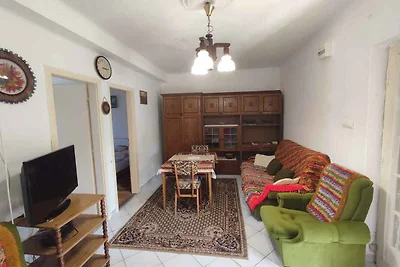 Ferienhaus mit Gartenmöbeln in der Nähe vom