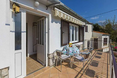 Ferienhaus mit Balkon und Klimaanlage