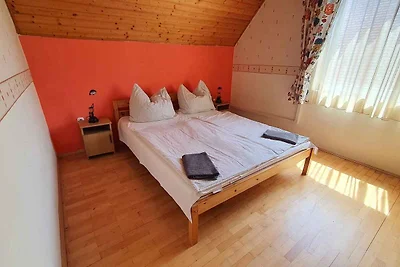 Ferienwohnung mit Kinderspielplatz und Balkon