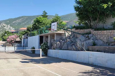 Ferienwohnung mit Poolnutzung und Meerblick