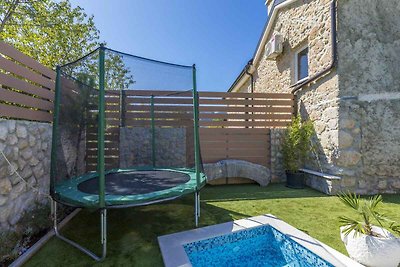 Ferienhaus mit Pool und Grill