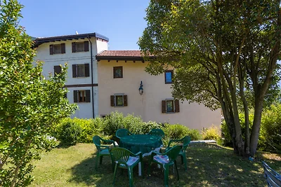 Ferienhaus mit Balkon und Garten