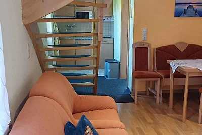 Ferienhaus mit Kinderschaukel und